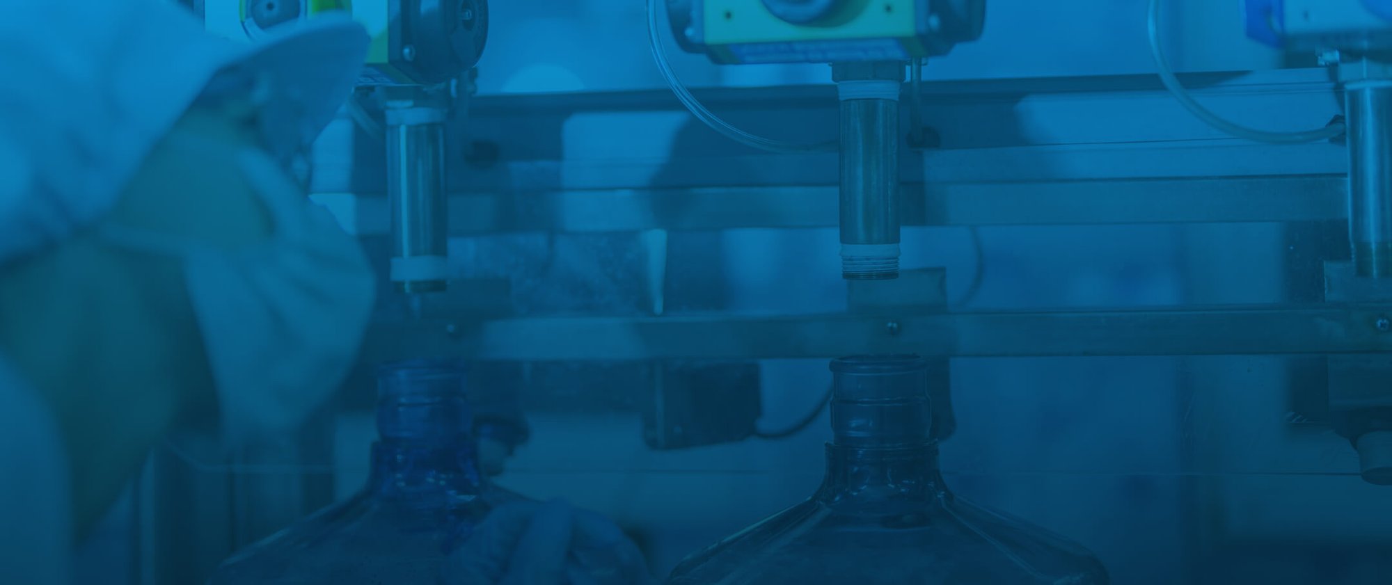scientist-worker-checking-quality-water-bottles-machine-conveyor-line-factory 1-1